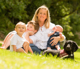 hearing dog Mene helping Amy