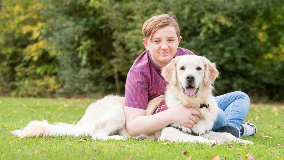 Joe Stock with hearing dog Travis