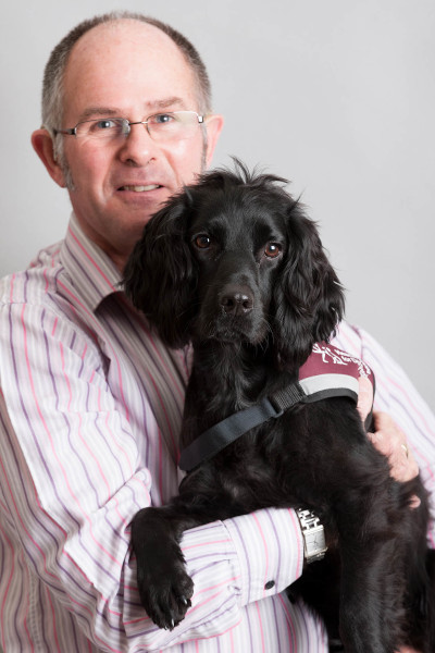 Richard with hearing dog Dillon