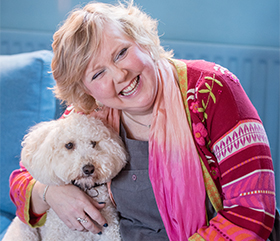 hearing dogs Kai and Primrose helping Sarah