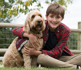 hearing dog cockapoo Nutmeg helping William
