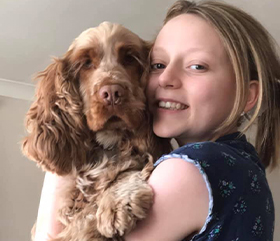 280x241 Amelia holding hearing dog Scamp