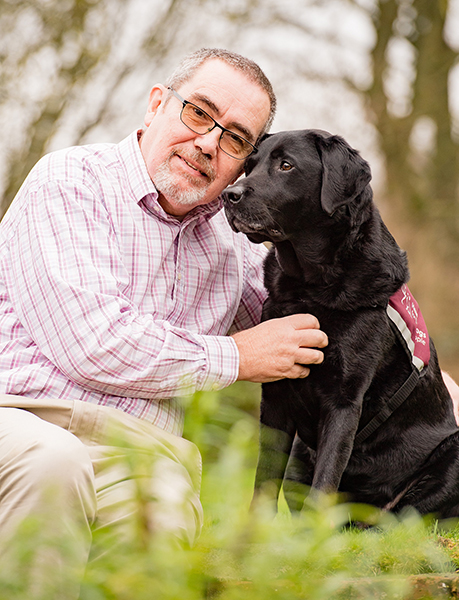 Chris and his hearing dog Rom