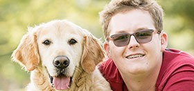 Ryan with hearing dog Harris