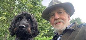 John and hearing dog Edgar