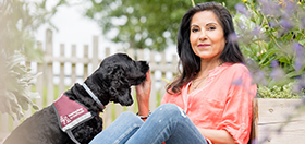 Shmita and her hearing dog - cockapoo Harris
