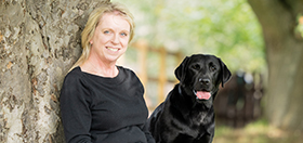 Carolann and hearing dog Walnut