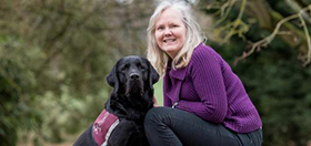 Jocelyne and hearing dog Kennedy