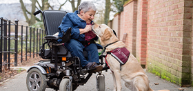 Sally and hearing dog Labrador