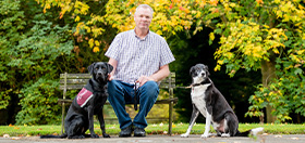 Steve and hearing dog Labrador