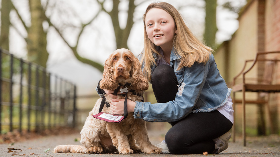 Amelia and cocker spaniel hearing dog Scamp